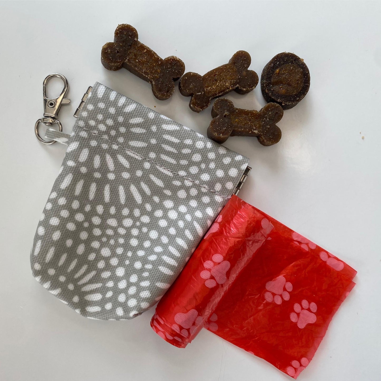 Waterproof mini snap-shut bag with lobster clip | dog treat bag | lip balm | earbuds | key holder | coin purse | doggy poo bags | lipstick